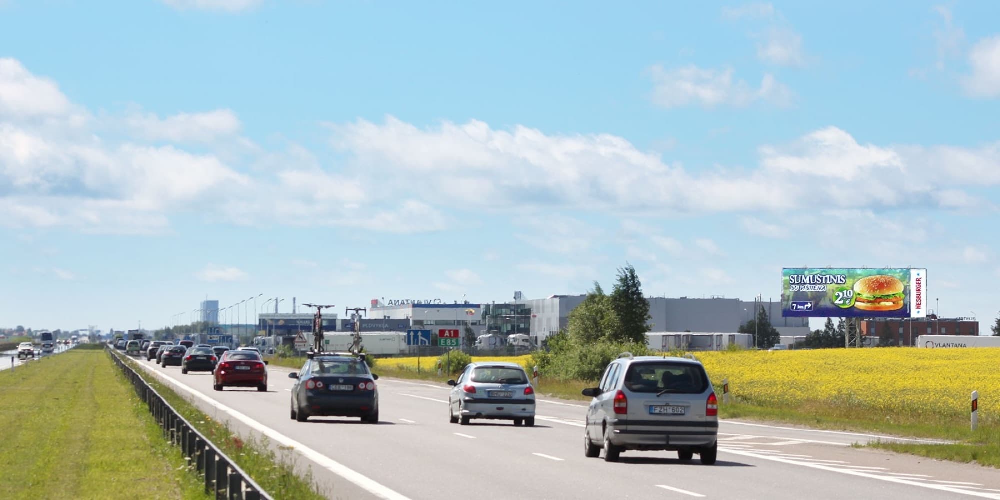 Autobahn A1, Kaunas - Klaipėda (rechte Seite), 1 km von Klaipėda — Reklamos stendas Pagrindiniai keliai