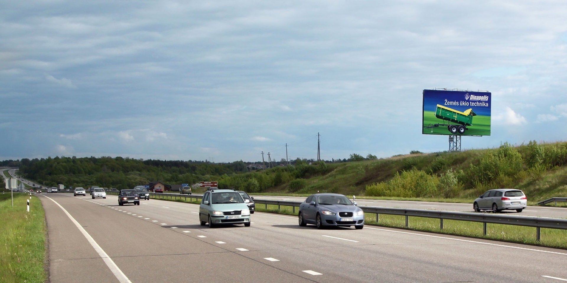 Autopista A1, Kaunas - Klaipėda, 122 km desde Vilna (lado izquierdo) — Valla publicitaria Pagrindiniai keliai