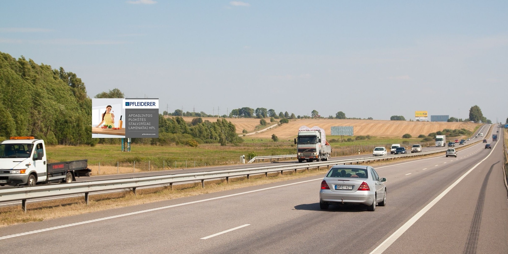 Valtatie A1, Kaunas - Vilnius (vasen puoli), 53,3 km Vilnasta — Reklamos stendas Pagrindiniai keliai