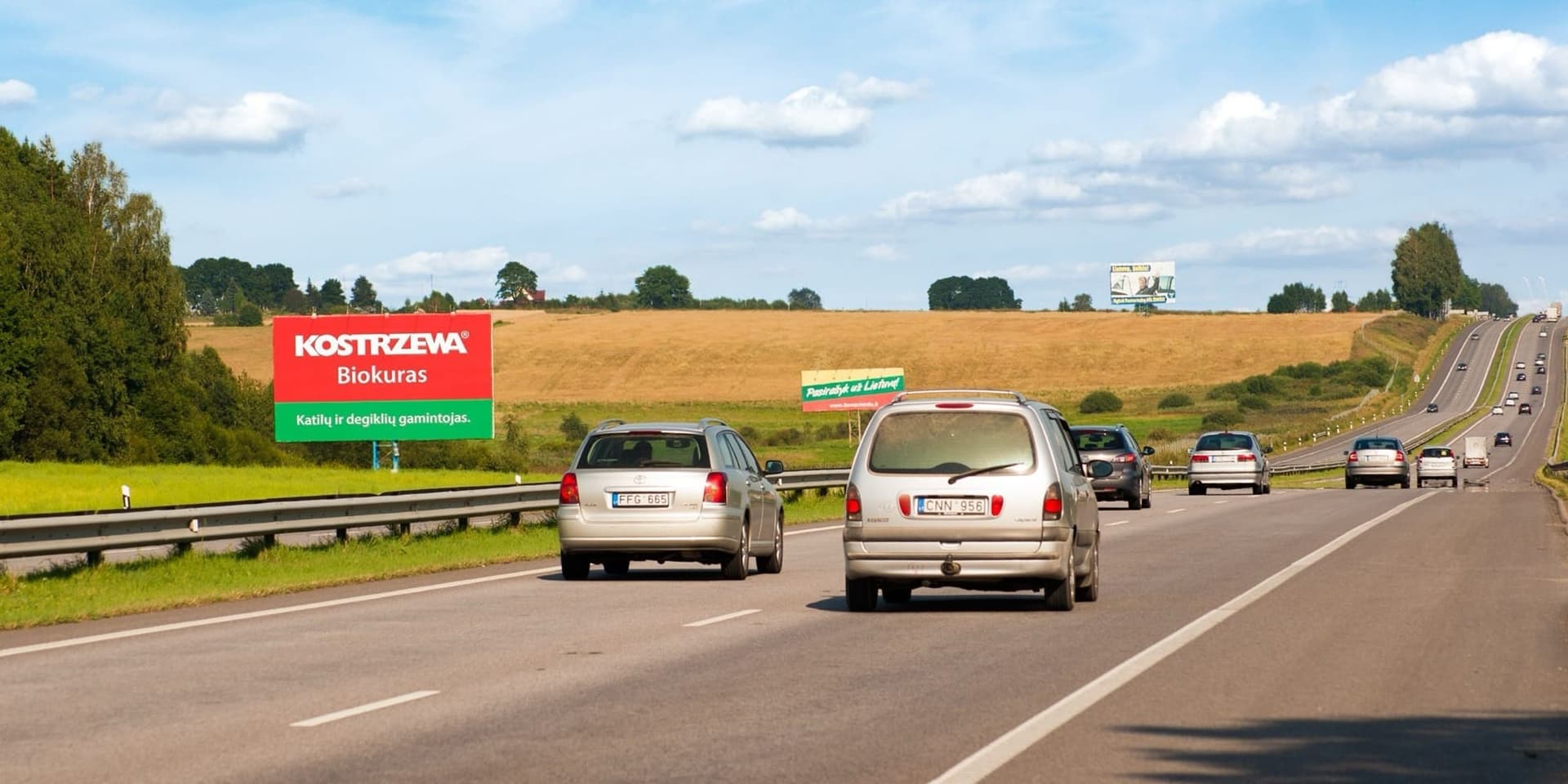 Autostrada A1, Vilnius - Kaunas (lato destro), 53,3 km da Vilnius — Cartellone pubblicitario Pagrindiniai keliai