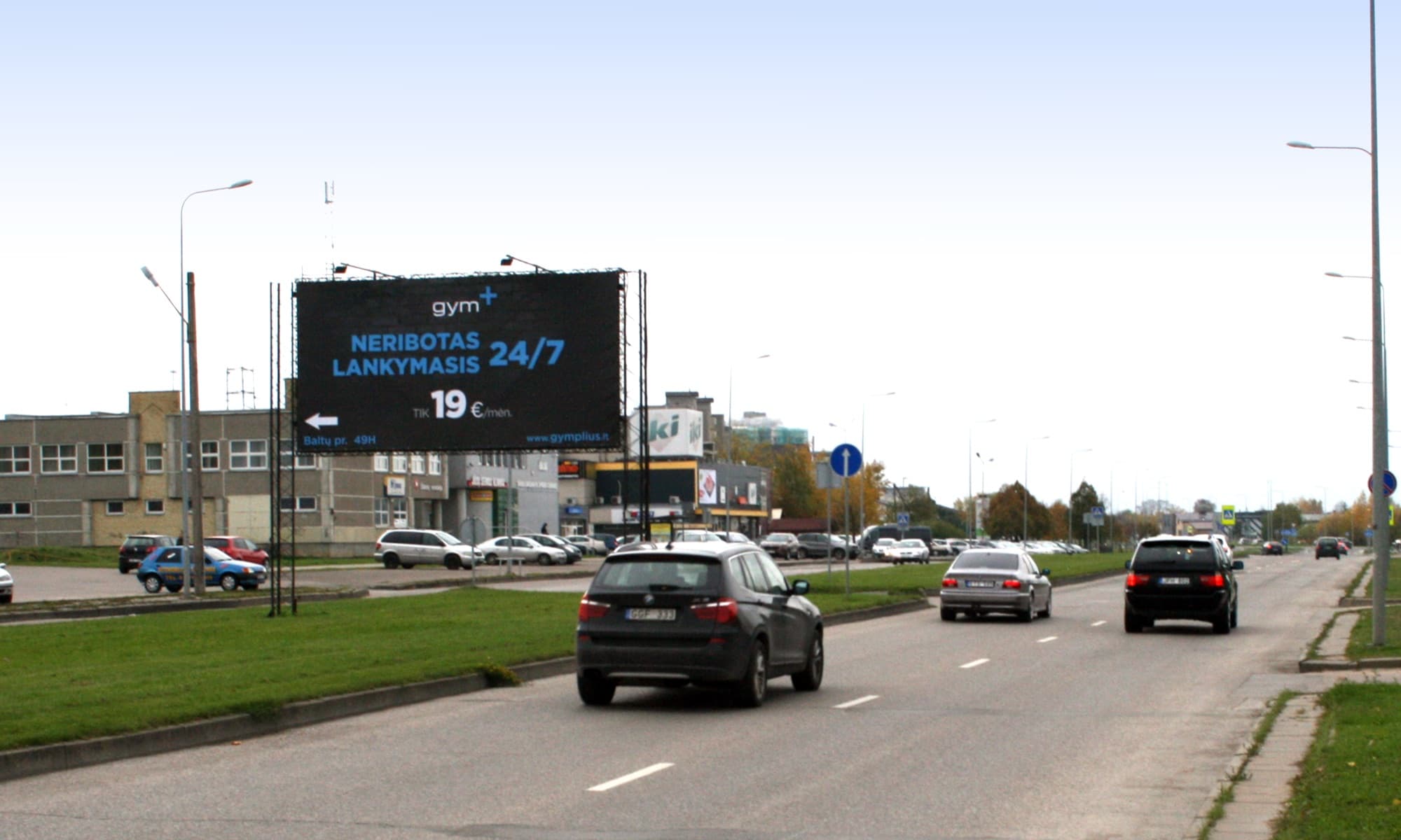 Reklameplakat på Baltų pr. ved PC "BALTAI", Kaunas (B-side) — Reklamos stendas Kaunas
