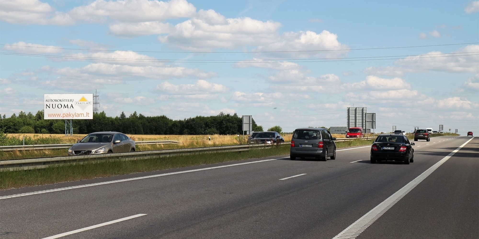 Kaunas - Vilnius, 78,4 km till Vilnius (vänster sida) — Reklamos stendas Pagrindiniai keliai