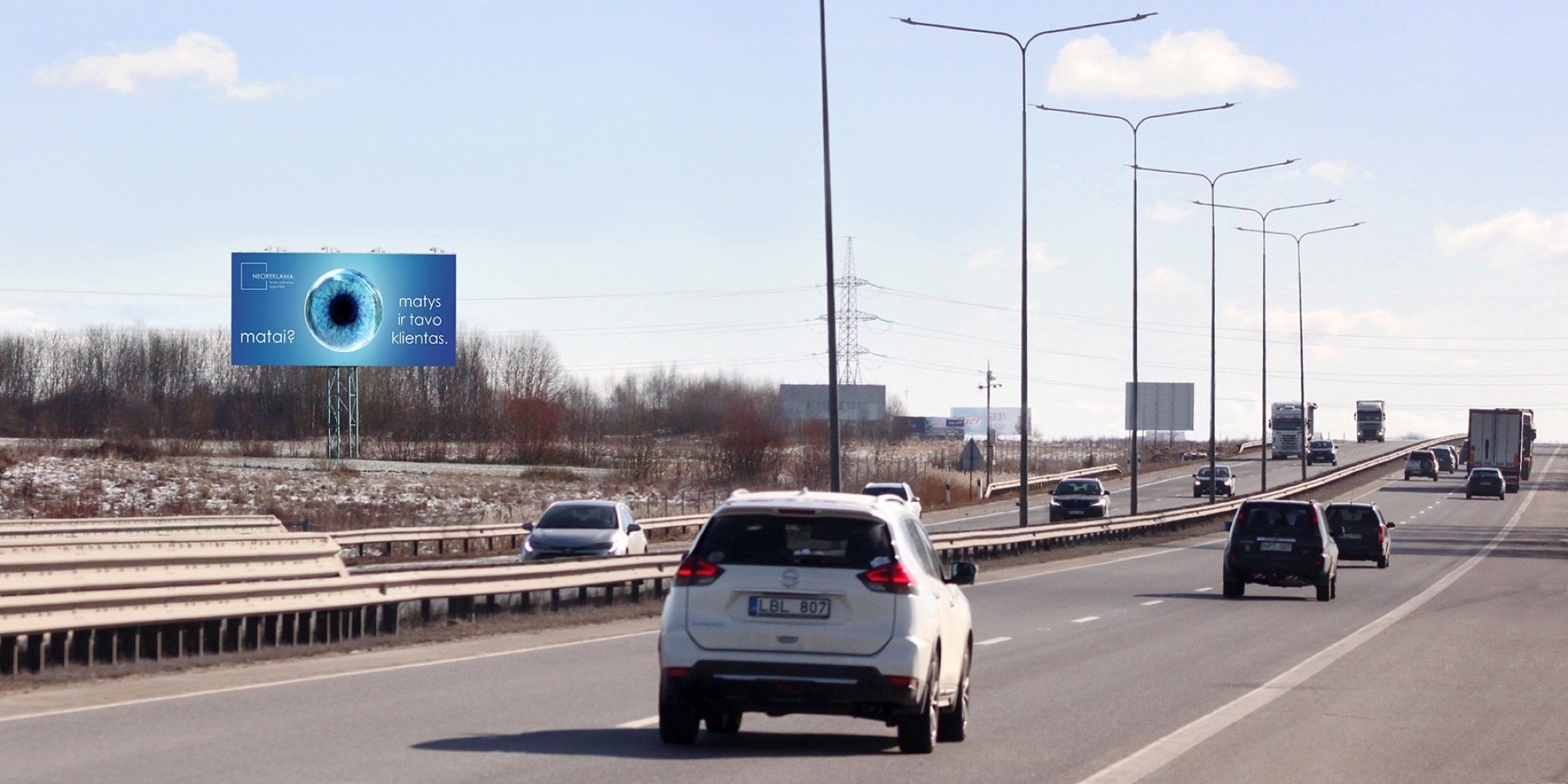 Kowno – Wilno, 78,4 km do Wilna (po lewej stronie) — Stojak reklamowy Pagrindiniai keliai