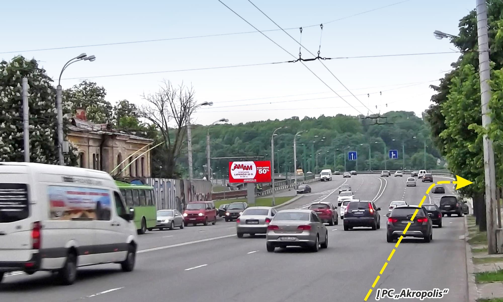 Advertising stand at the intersection of M.K.Čiurlionio g. and Kaunakiemio g., near the Kaunakiemio g. entrance, Kaunas (Side A) — Advertising stand Kaunas