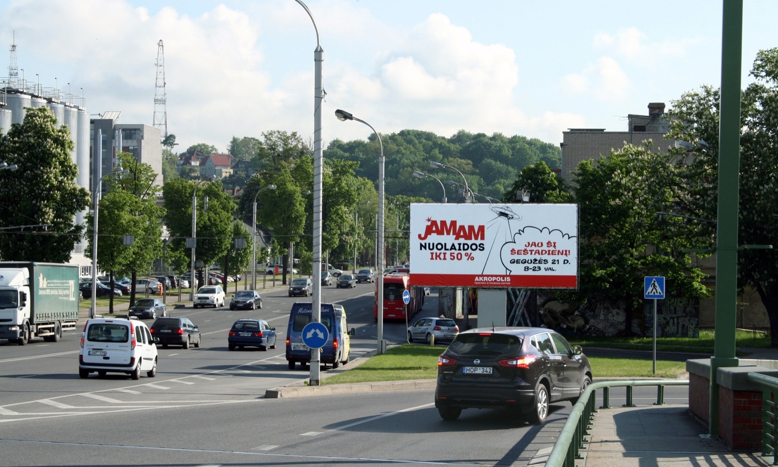 Reklamos stendas M.K.Čiurlionio g. ir Kaunakiemio g. sankryža, netoli Kaunakiemio g. įvažos, Kaunas (B pusė) — Reklamos stendas Kaunas