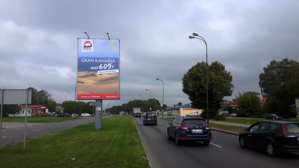 Reklameplakat på Minijos g., Klaipėda (B-side) — Reklamos stendas Klaipėda