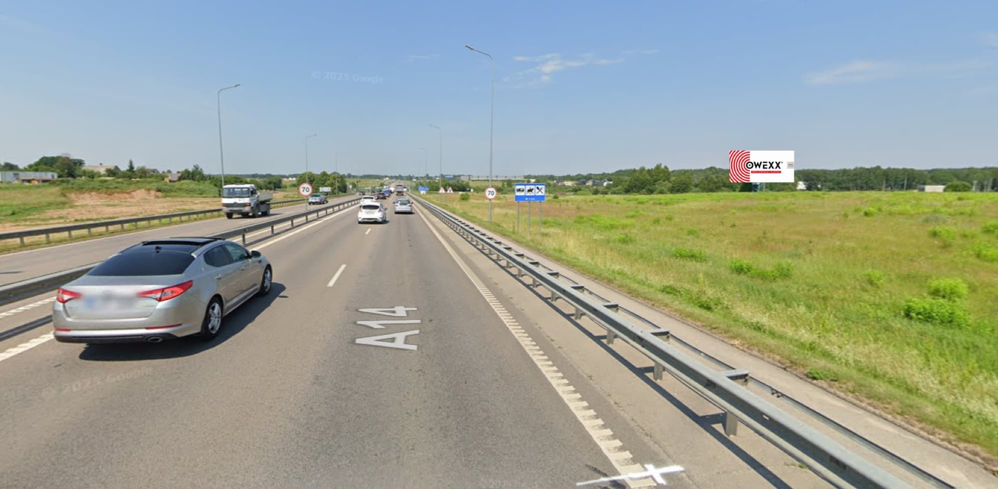 Tablica reklamowa droga Molėtų, 14 km od Wilna