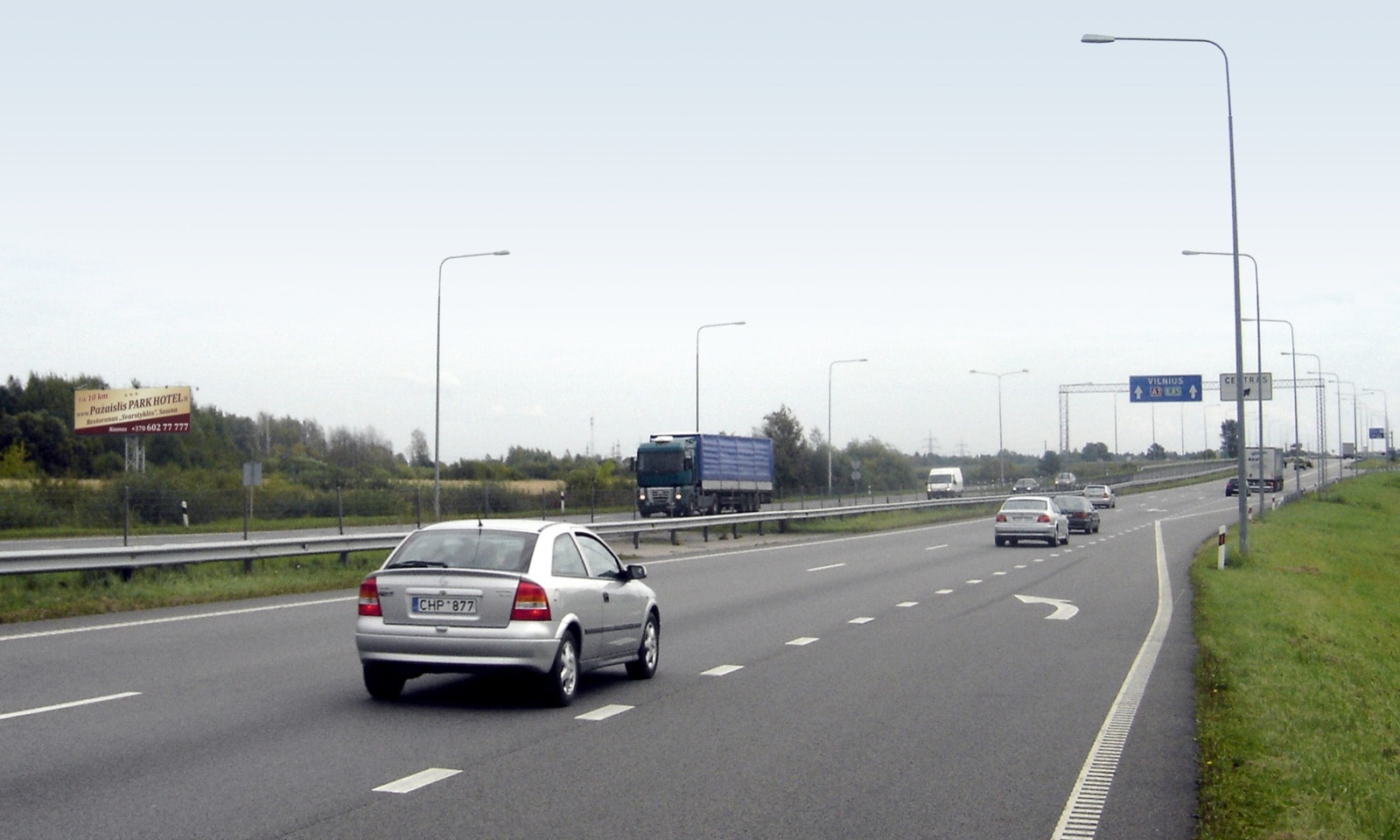 Reklamos stendas Prie Kauno, Islandijos pl., prie įvažiavimo iš magistralės A6 į A1, Kaunas (B pusė) — Reklamos stendas Kaunas