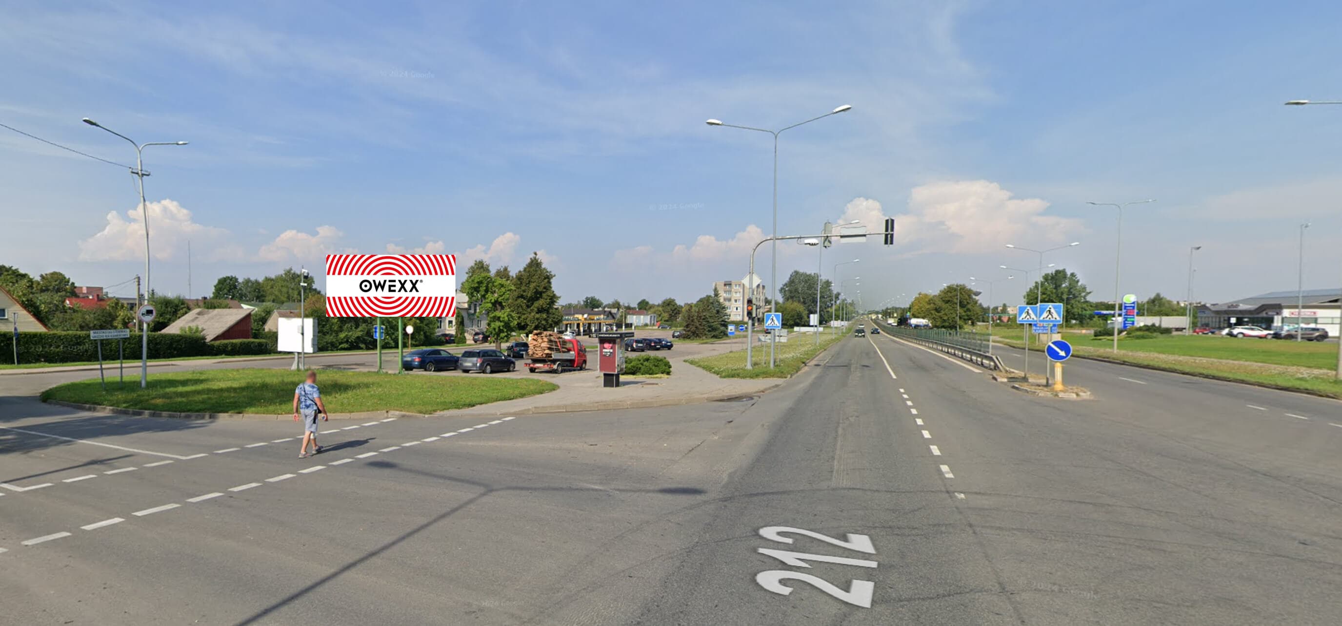 Panneau publicitaire à l'intersection des rues Šiauliai et Gedimino, Radviliškis (côté gauche)