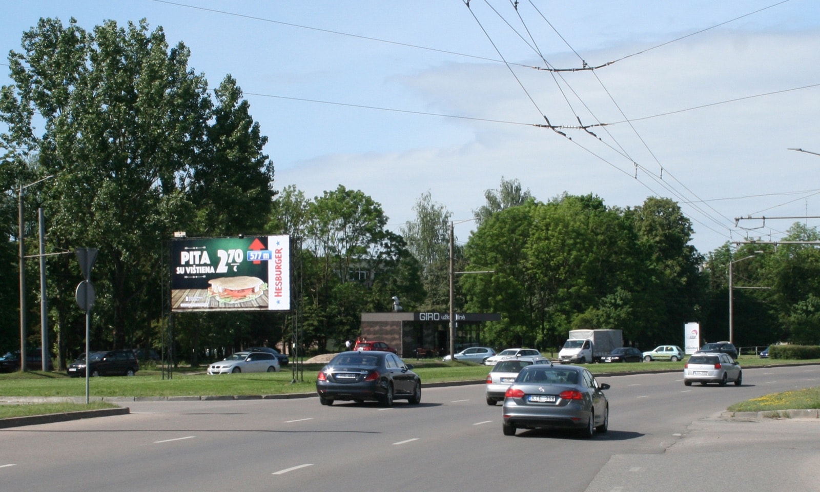 Reklamos stendas Taikos pr., netoli Kovo 11-osios g. žiedo, Kaunas (A pusė) — Reklamos stendas Kaunas