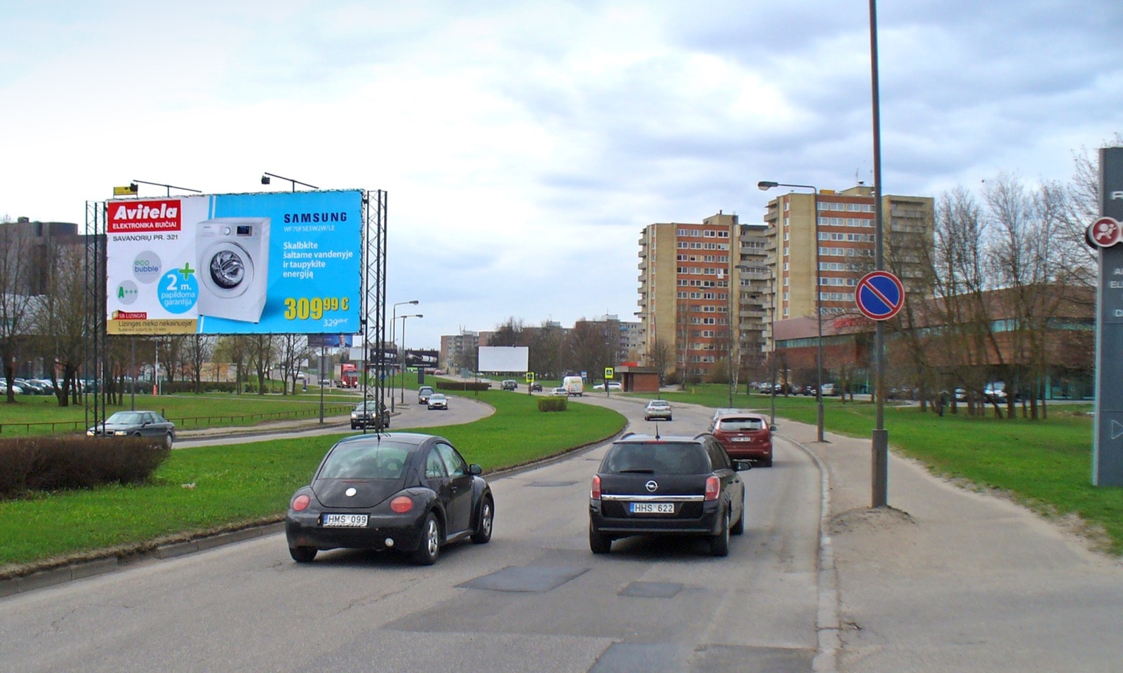 Reklamos stendas Taikos pr., prie pastato Nr. 127 ("MELGA"), Kaunas (A pusė) — Reklamos stendas Kaunas