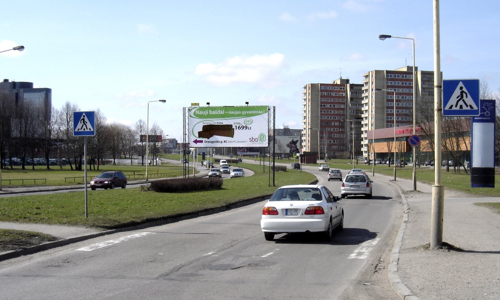 Reklamos stendas Taikos pr., prie pastato Nr. 127 ("MELGA"), Kaunas (A pusė) — Reklamos stendas Kaunas