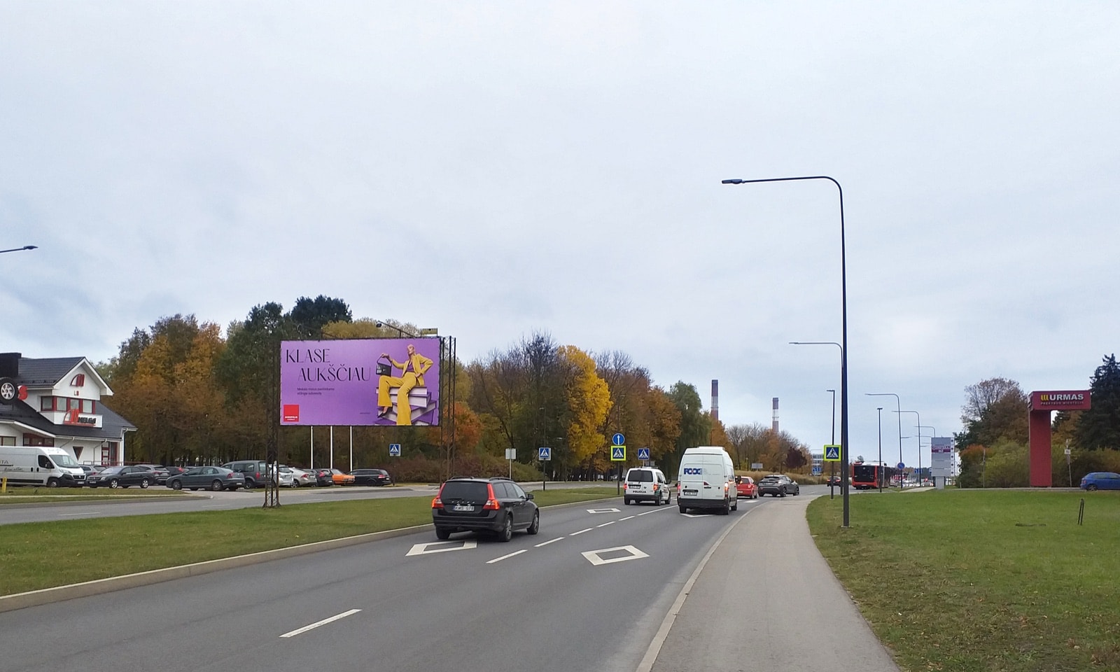 Reklamos stendas Taikos pr., prie pastato Nr. 127 ("MELGA"), Kaunas (B pusė) — Reklamos stendas Kaunas