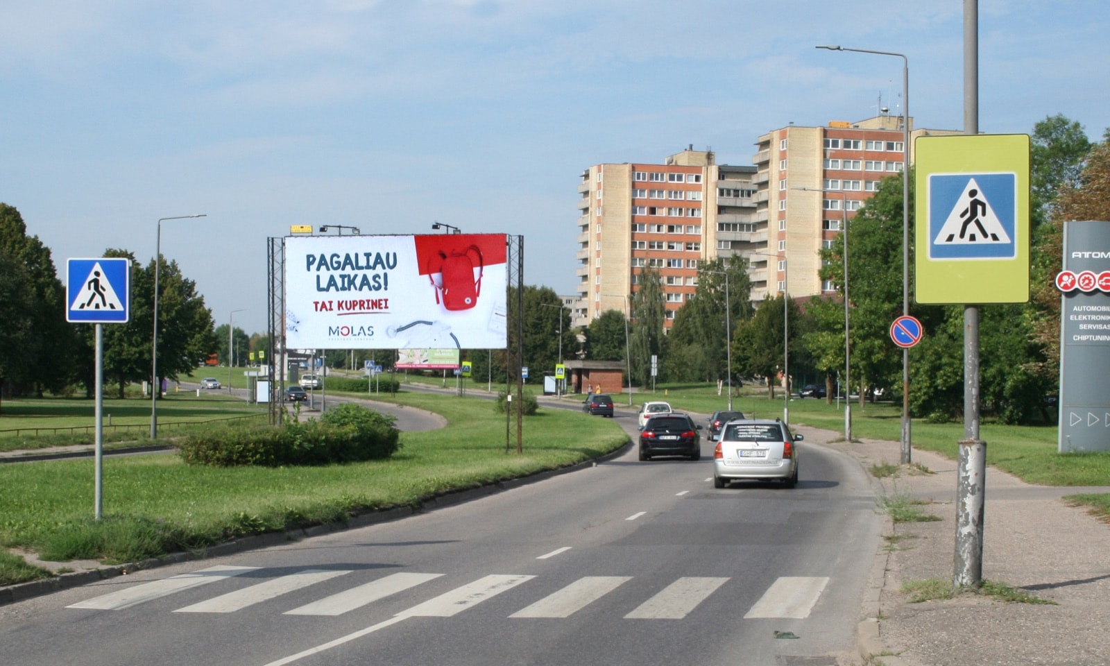 Reklamos stendas Taikos pr., prie pastato Nr. 127 ("MELGA"), Kaunas (A pusė) — Reklamos stendas Kaunas