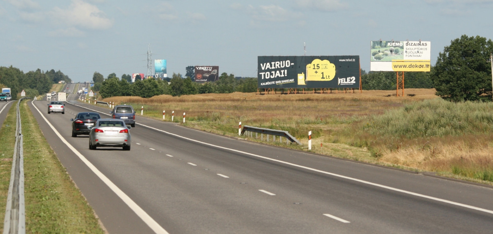 Vilnius - Kaunas, 67,5 km nuo Vilniaus (dešinėje pusėje) — Reklamos stendas Pagrindiniai keliai
