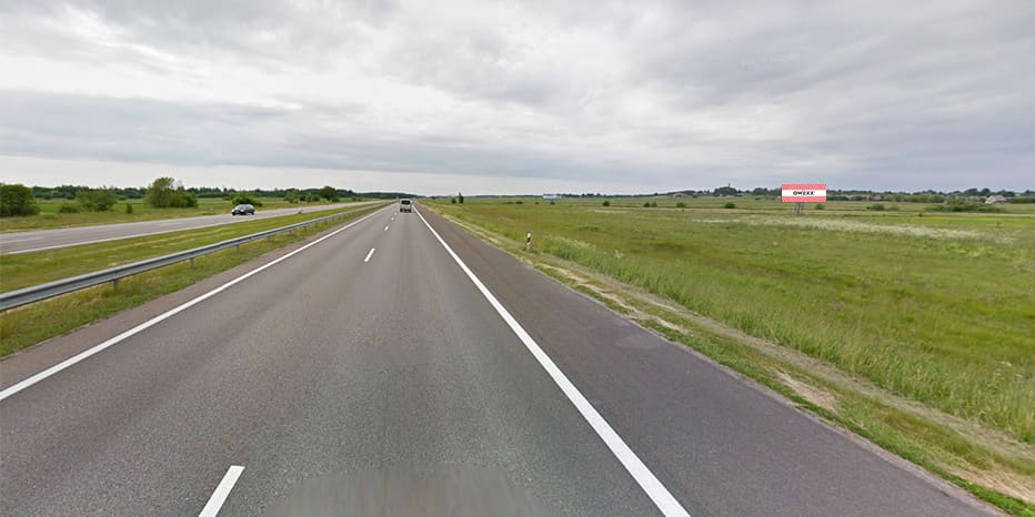 Panneau publicitaire Vilnius - Kaunas - Klaipėda, 183 km de Vilnius II (côté droit) — Panneau publicitaire Pagrindiniai keliai