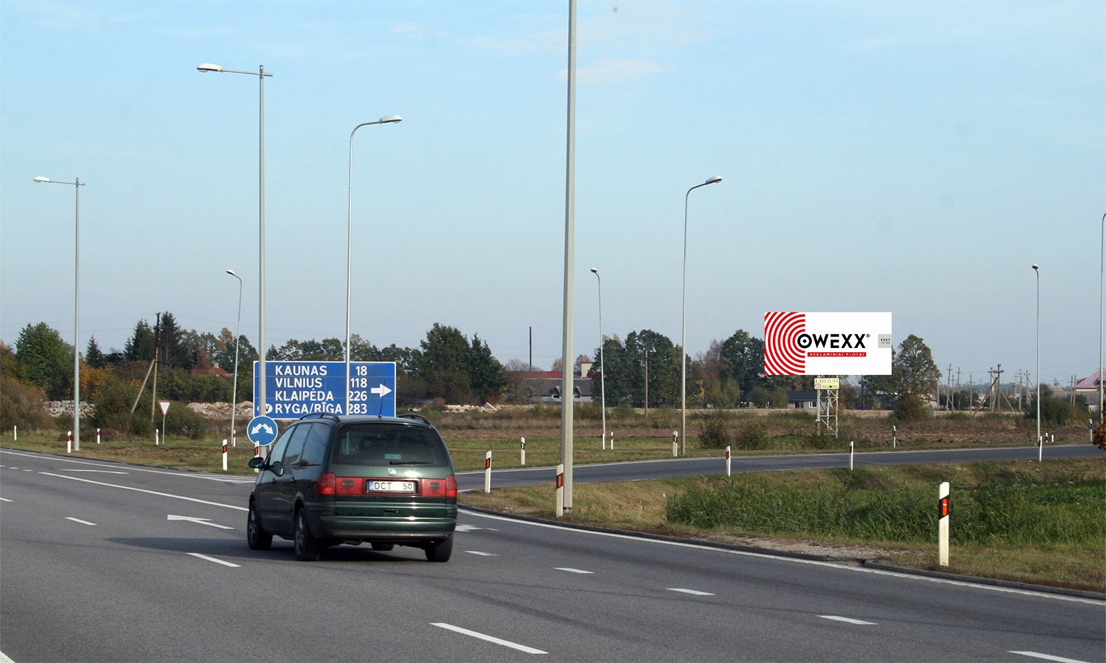 Reklamskylt Kaunas - Marijampolė, 19 km från Kaunas (vänster sida) — Reklamos stendas Pagrindiniai keliai