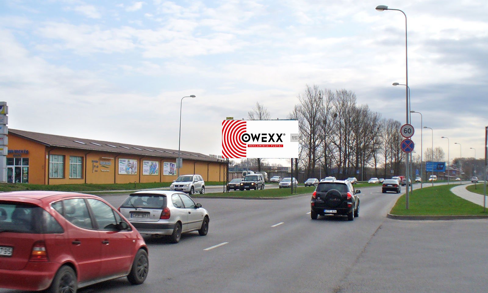 Reklamos stendas Europos pr., prie pastato Nr. 67 (prie "Ratai visiems"), Kaunas (A pusė) — Reklamos stendas Kaunas