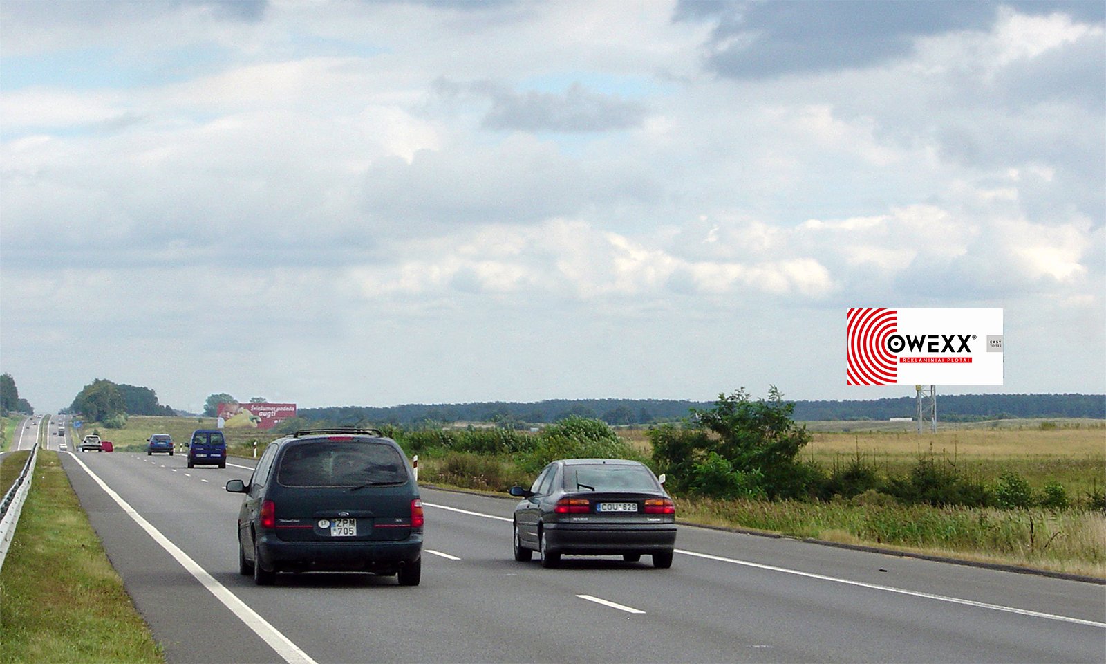 Reklamskylt Klaipėda - Kaunas - Vilnius, 54 km till Vilnius (höger sida) — Reklamos stendas Pagrindiniai keliai