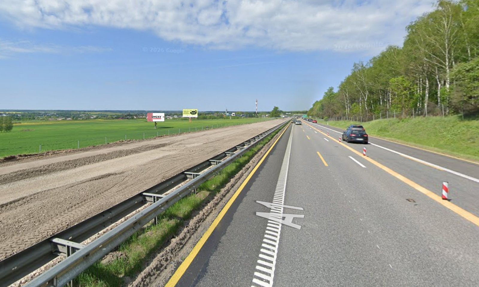 Reklamos stendas Vilnius - Kaunas - Klaipėda, 249,6 km iki Klaipėdos (kairėje pusėje) — Reklamos stendas Pagrindiniai keliai