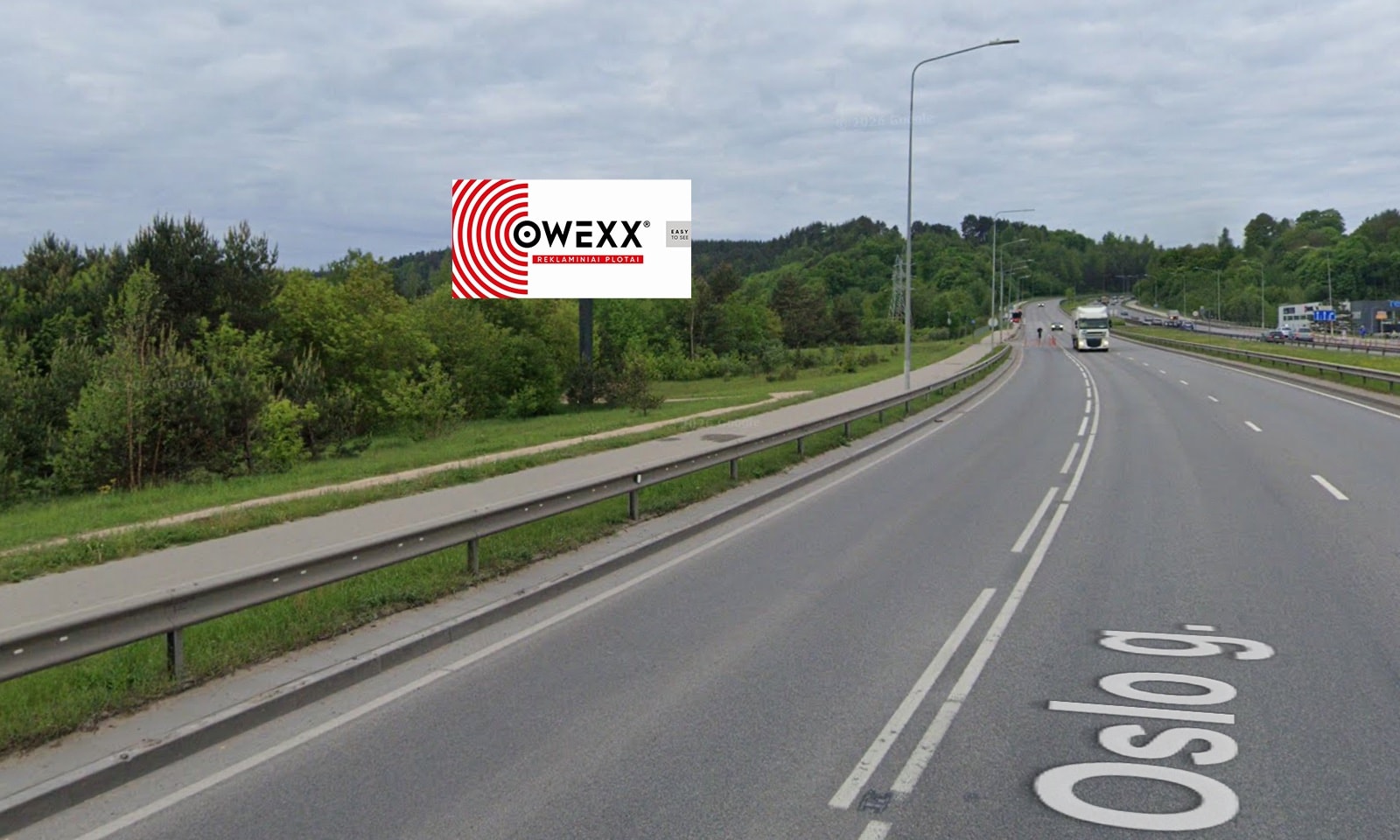 Reklamos stendas Gariūnų g., iš Vilniaus, kairėje gatvės pusėje, Vilnius — Reklamos stendas Vilnius