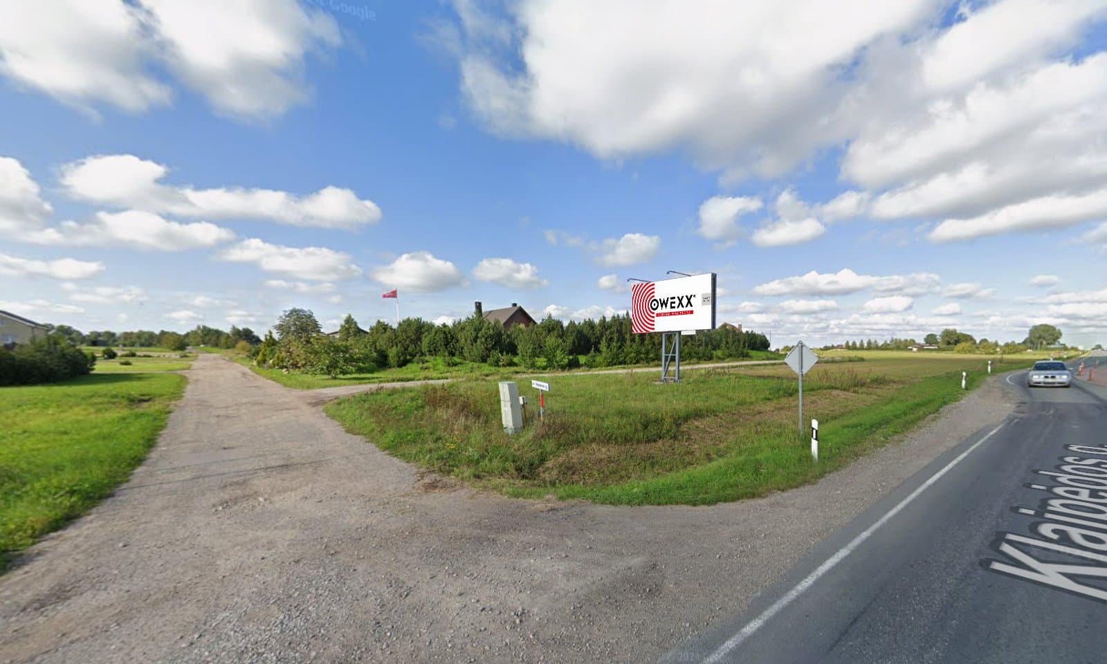 Reklamskylt i Kretingalė by, Klaipėda distrikt (A-sida)