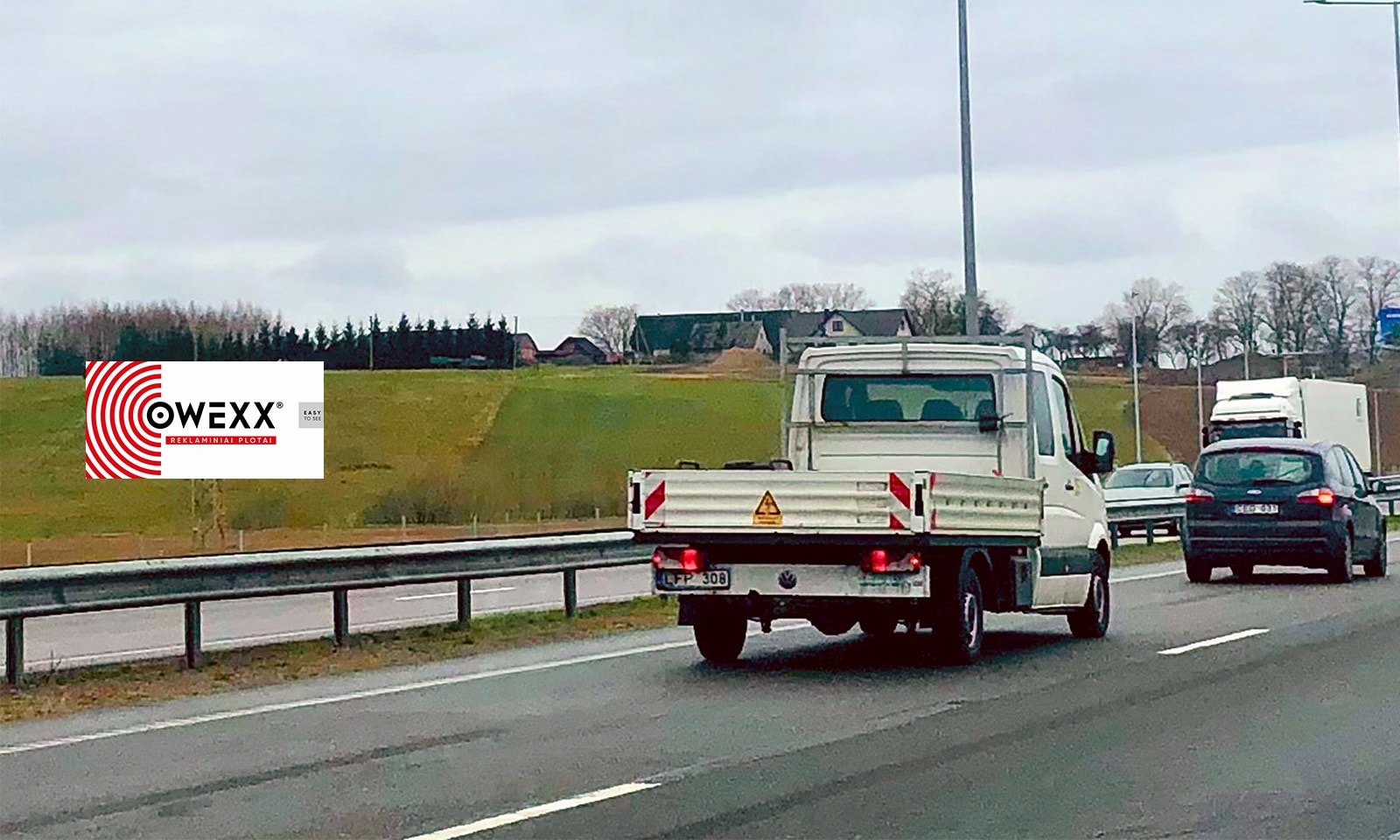 Vilnius - Kaunas - Klaipėda, 55 km nuo Vilniaus (kairėje pusėje) — Reklamos stendas Pagrindiniai keliai