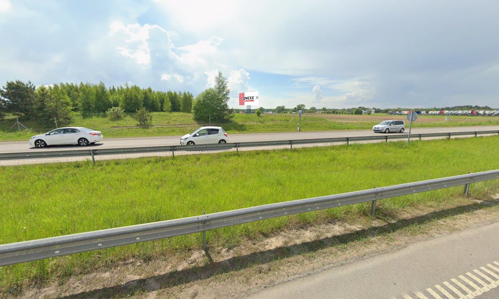 Reklamos stendas, Vilnius–Panevėžys 14km (K pusė)