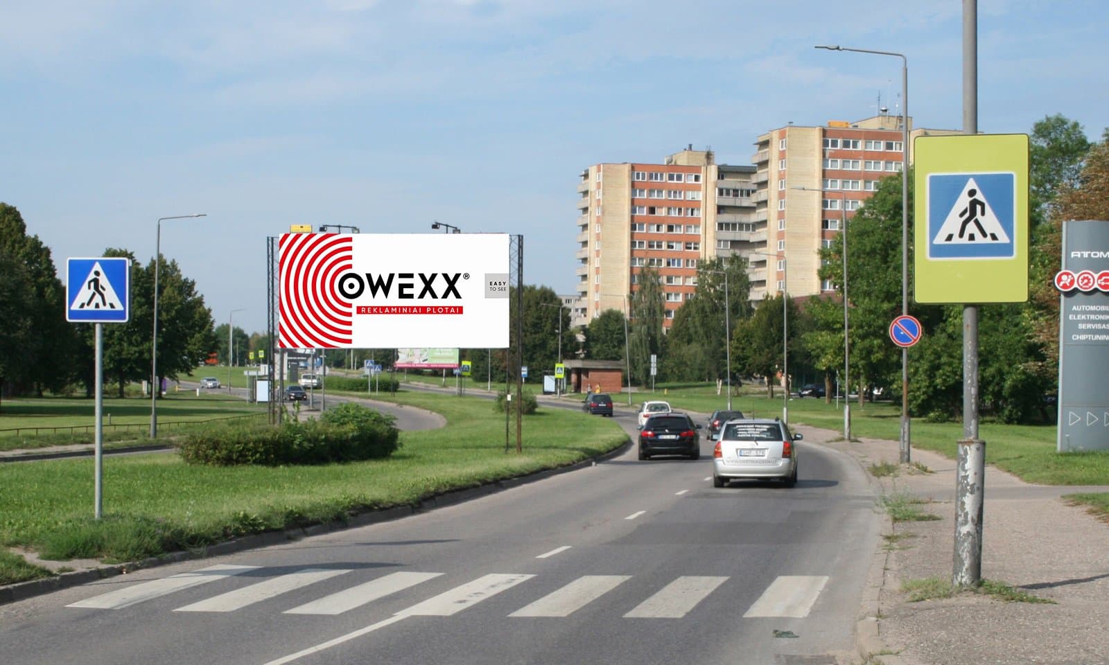 Reklamtavla vid Taikos pr., intill byggnad nr 127 ("MELGA"), Kaunas (A-sida)