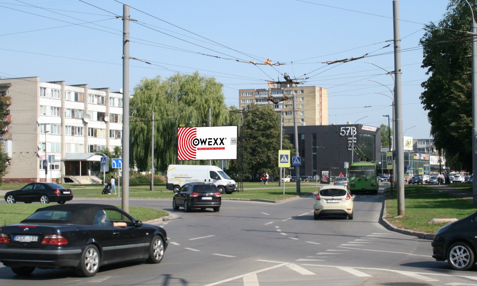 Reklamskylt på V.Krėvės pr., vid korsningen med Kovo 11-osios g. nära hus 51, Kaunas (B-sidan) — Reklamos stendas Kaunas